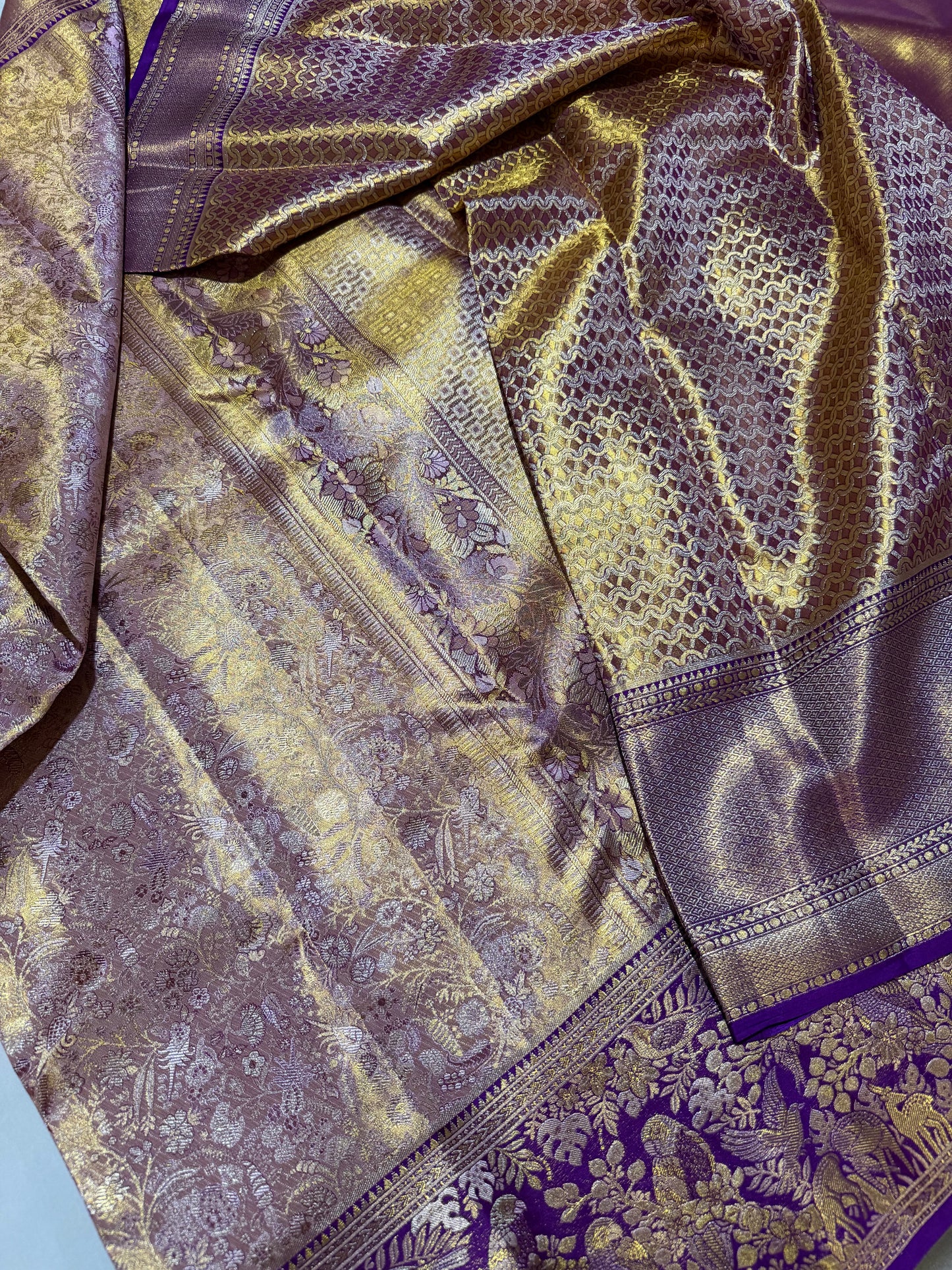 Biscuit Color Pure Kanchipattu Saree with Gold Zari Brocade Body and Meenakari Purple Border