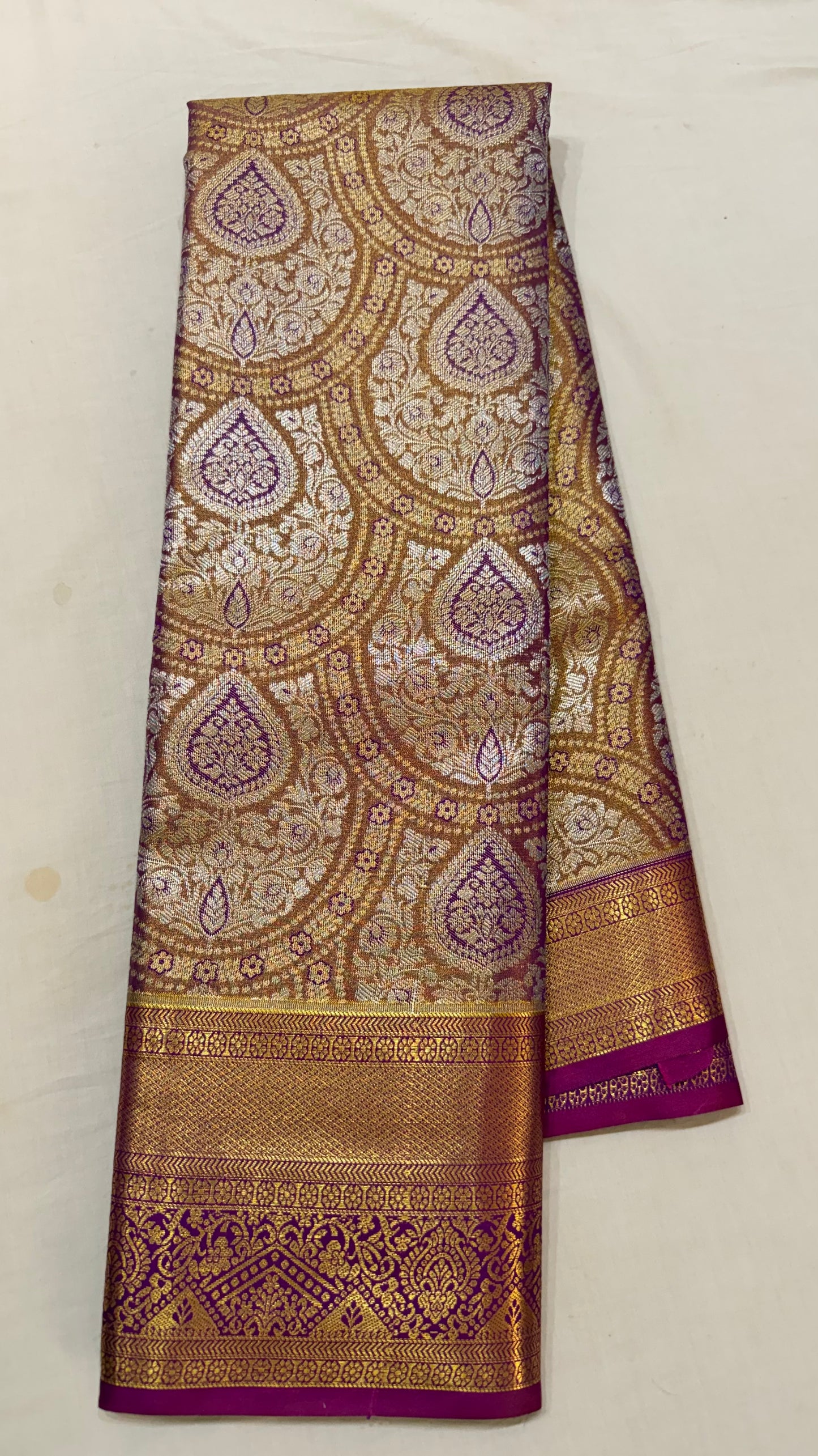 Orange pink Semi Kanchipattu sarees with traditional border