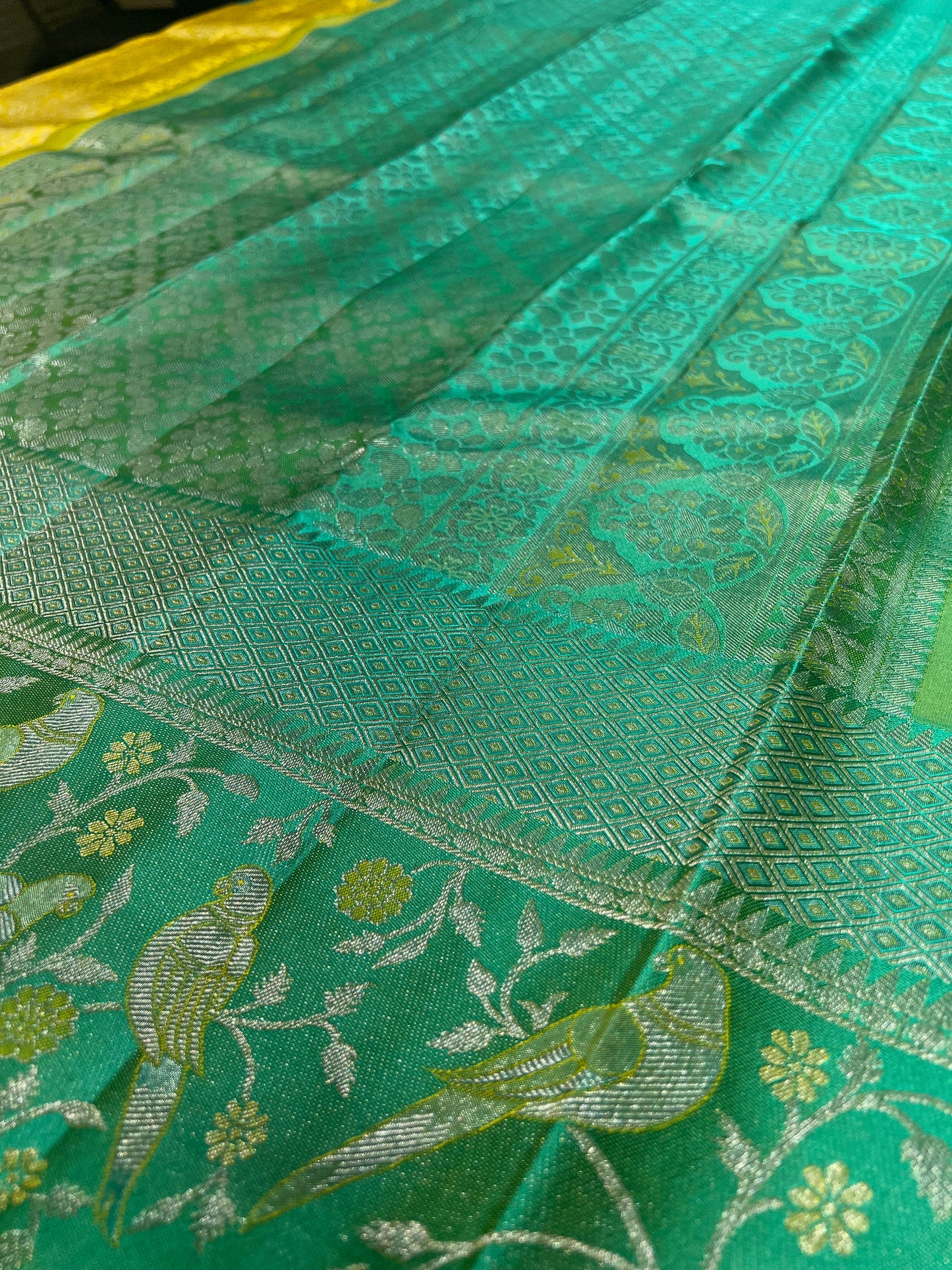 Mustard Yellow Brocade Pure Kanchipattu Saree with Sea Green Meenakari Border and 1 Gram Silver Zari