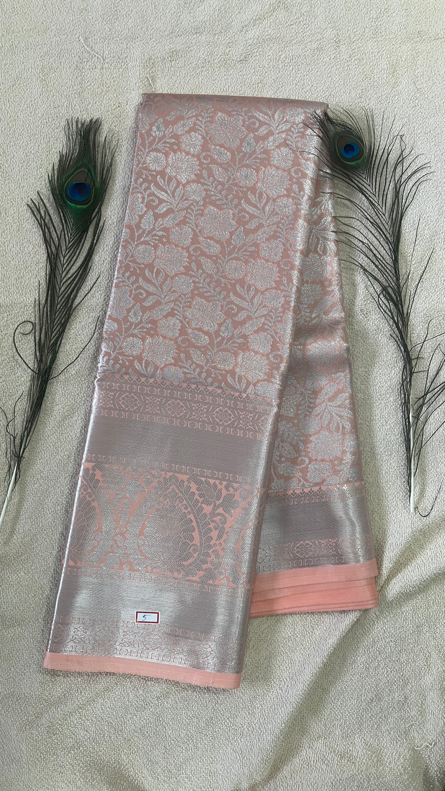 Pastel Peach Pink and silver Semi Kanchipattu silk sarees with self traditional border