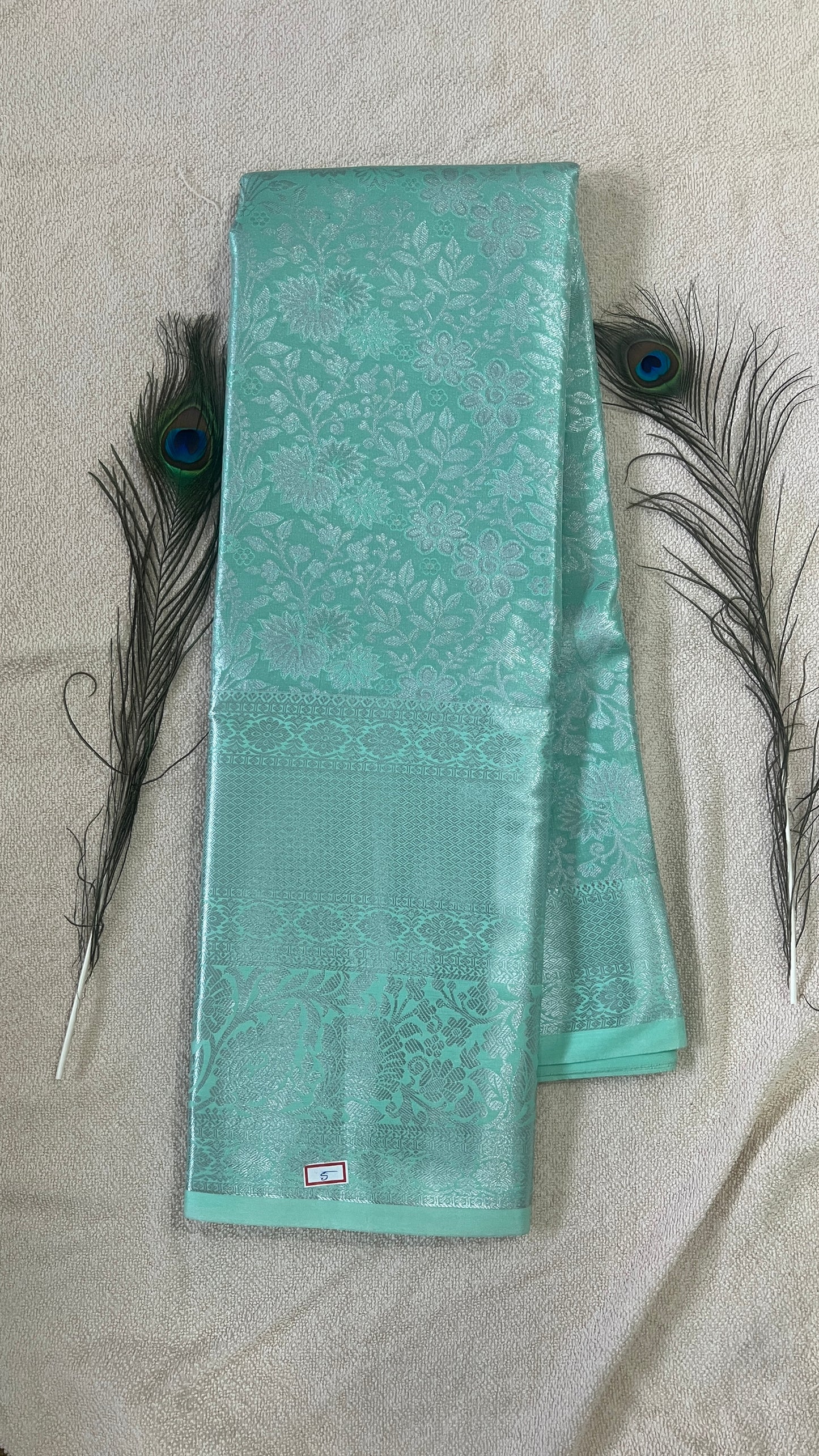 Pastel Mint Green and silver Semi Kanchipattu silk sarees with self traditional border