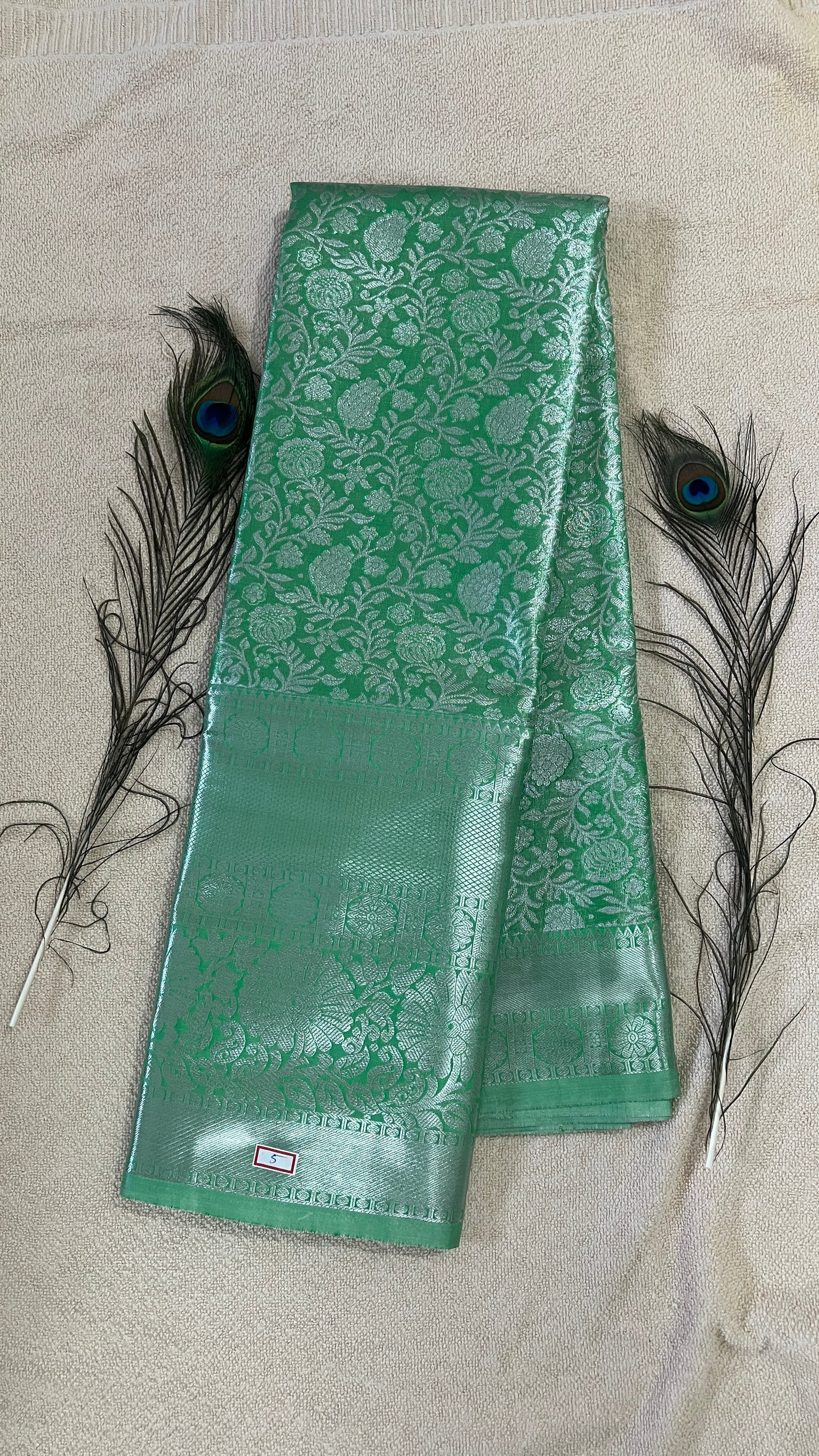 Pastel Green lace and silver Semi Kanchipattu silk sarees with self traditional border