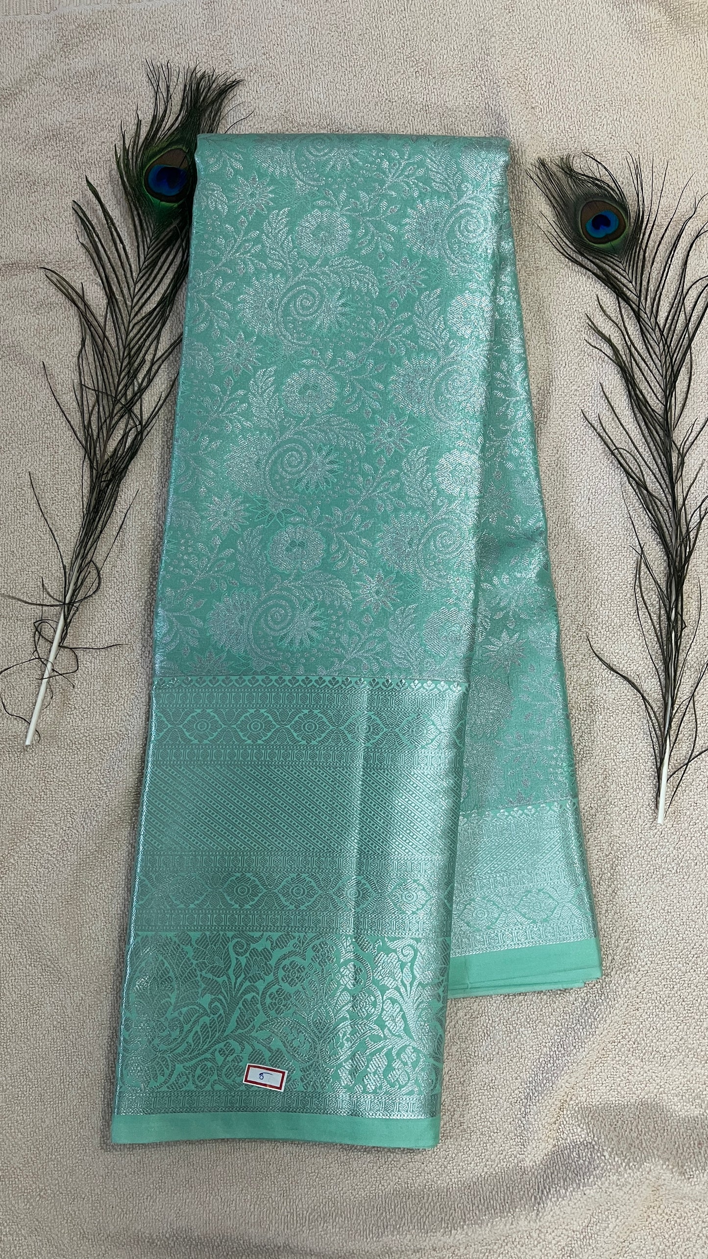 Pastel Sea Green and silver Semi Kanchipattu silk sarees with self traditional border