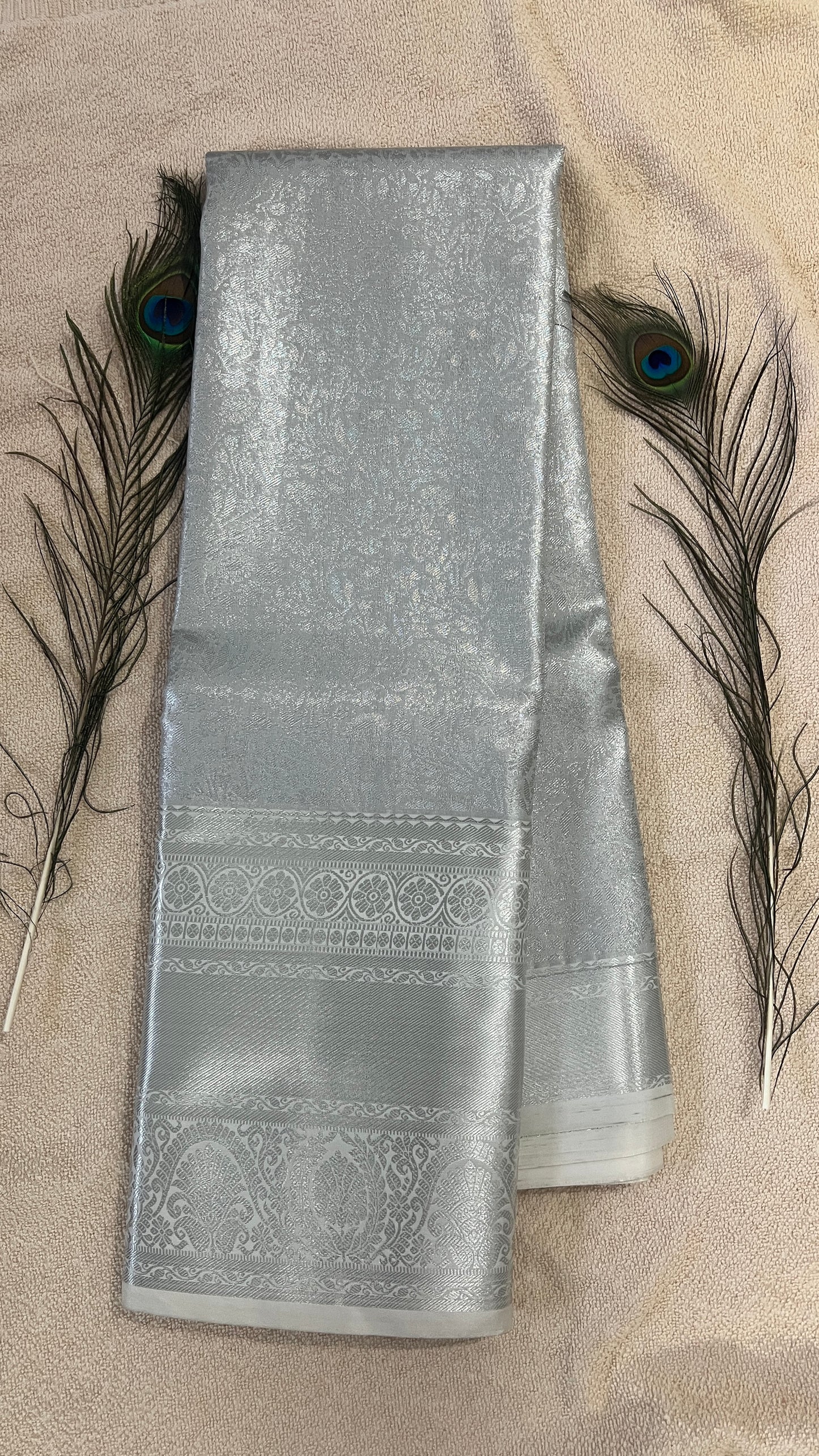 Pastel Semi Kanchipattu silk Silver sarees with self traditional border