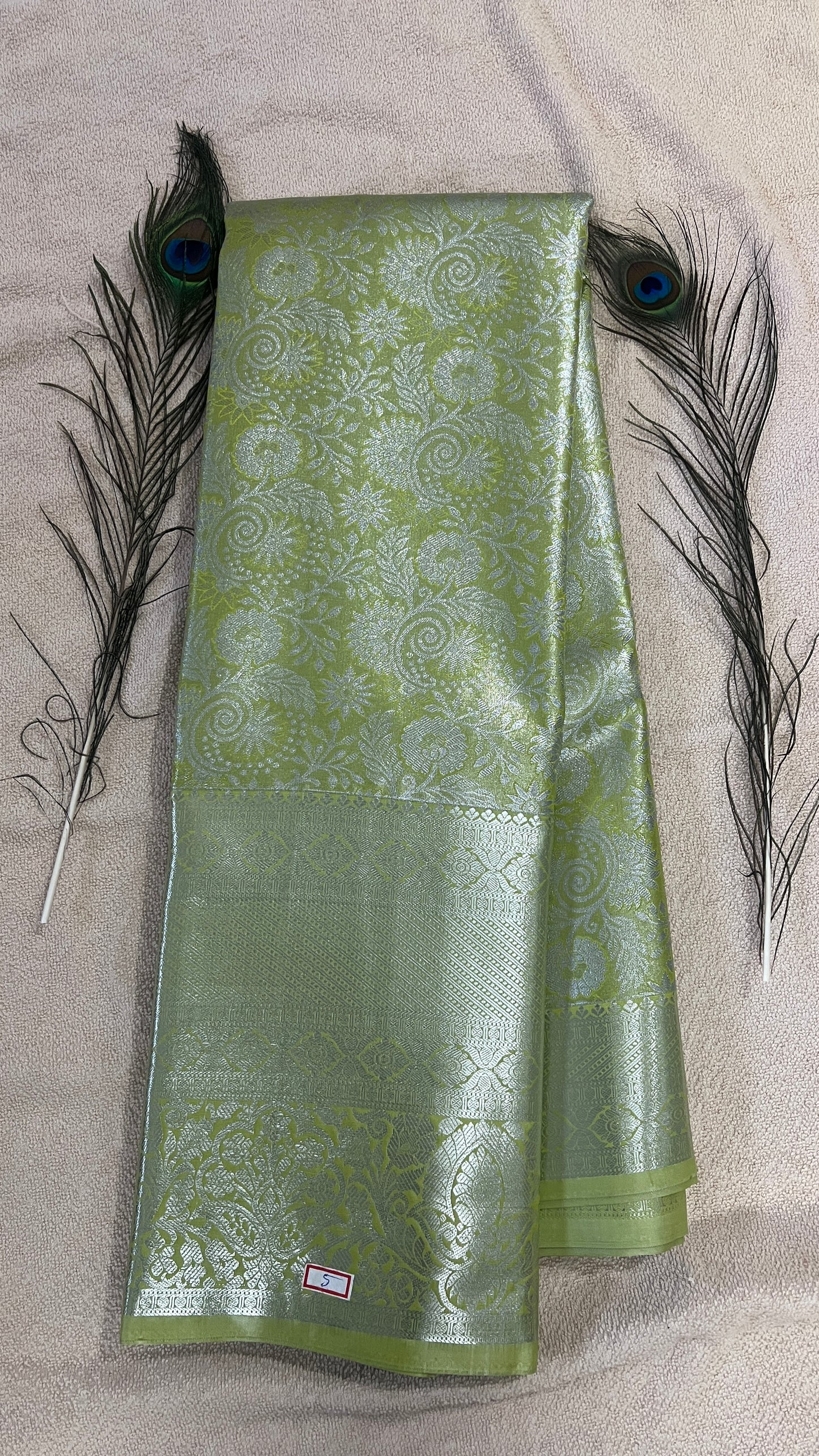 Pastel Lime Green and silver Semi Kanchipattu silk sarees with self traditional border