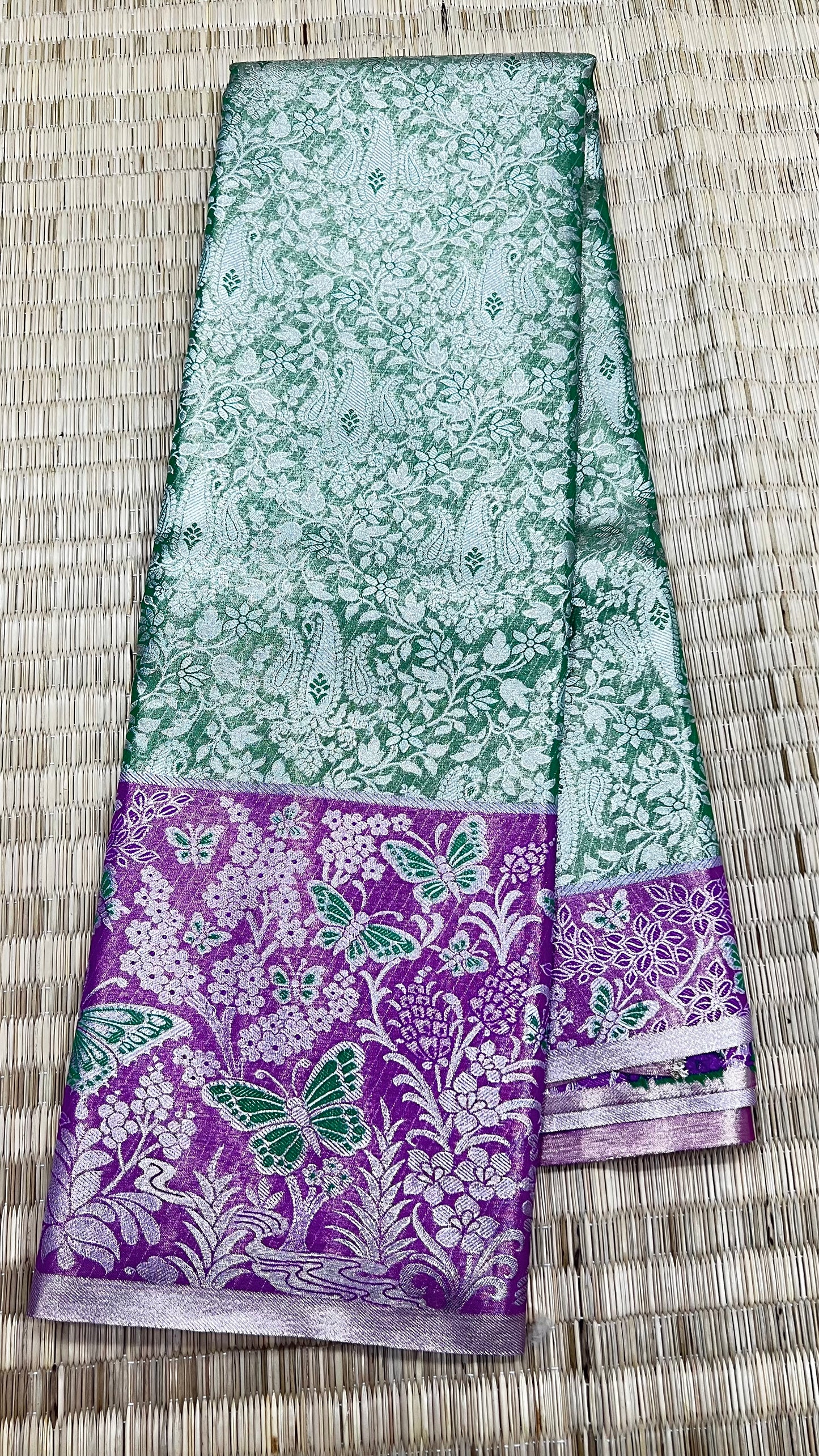 Green and purple Semi Kanchipattu sarees with butterfly patterns traditional Meenakari border