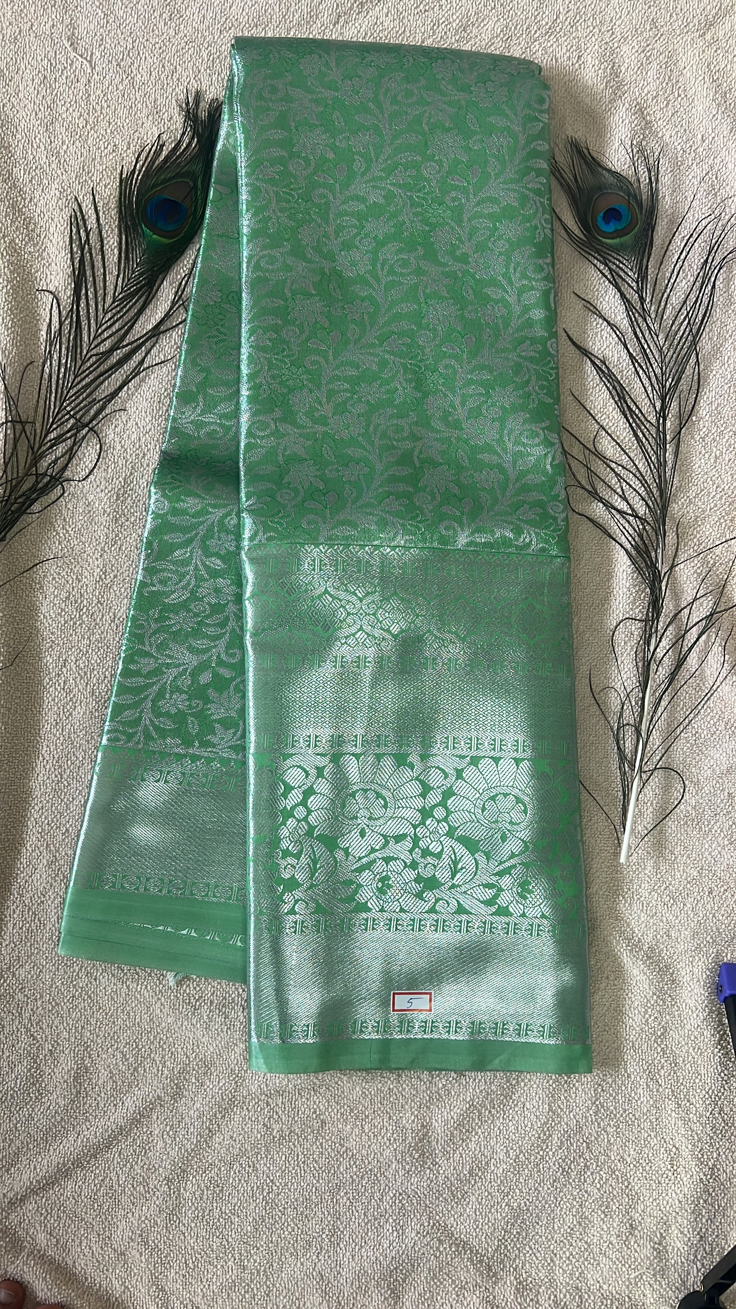Pastel Green and silver Semi Kanchipattu silk sarees with self traditional border