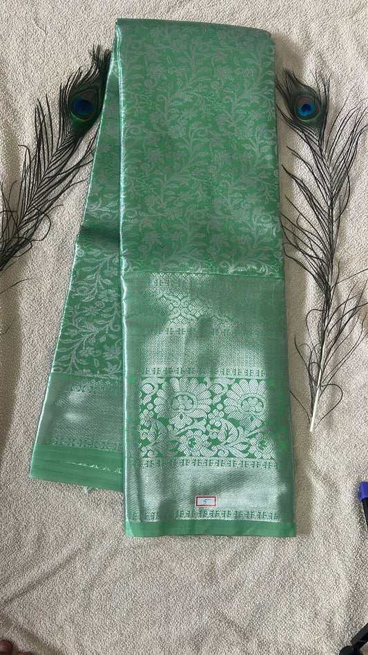 Pastel Green and silver Semi Kanchipattu silk sarees with self traditional border