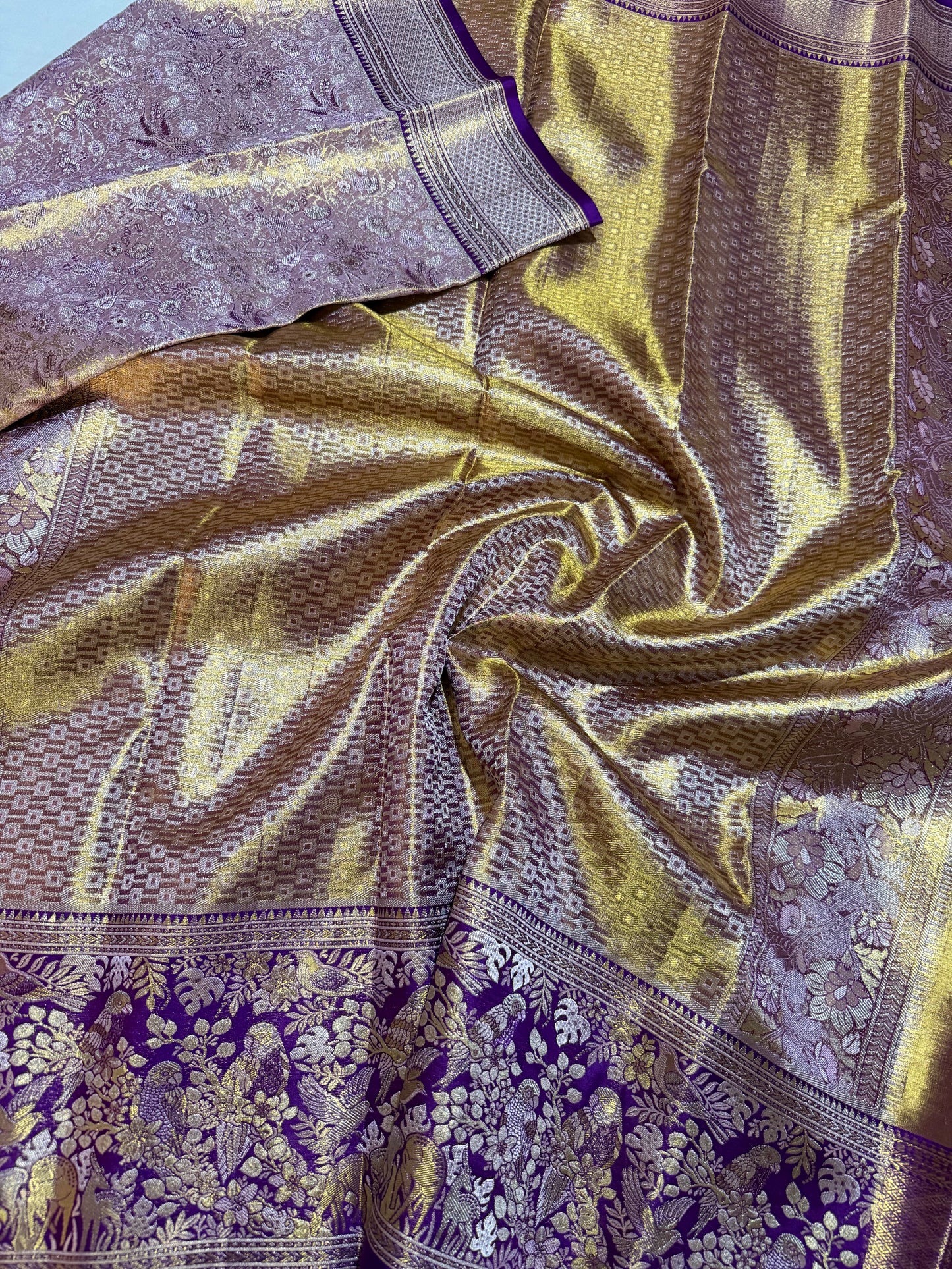 Biscuit Color Pure Kanchipattu Saree with Gold Zari Brocade Body and Meenakari Purple Border