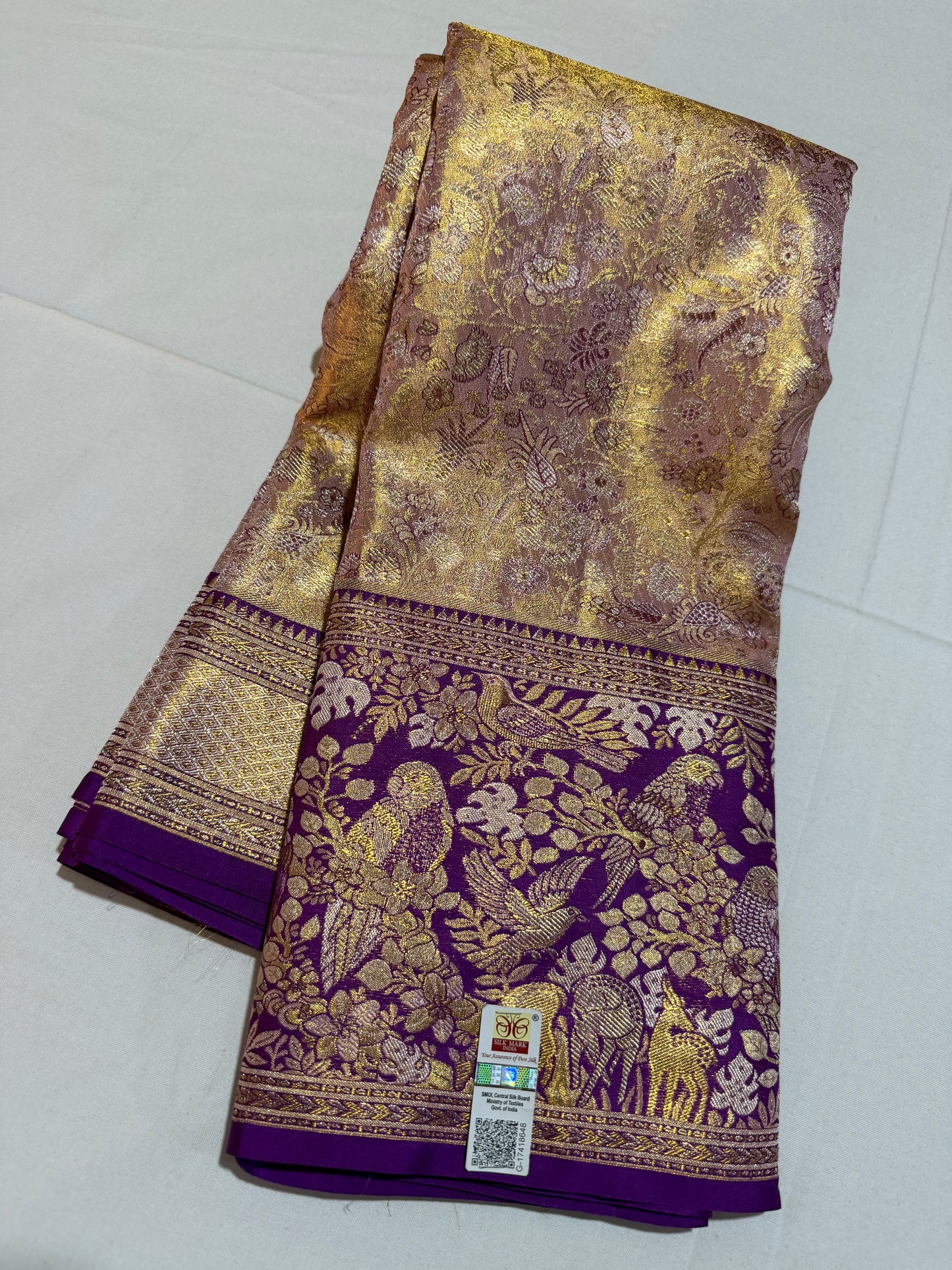 Biscuit Color Pure Kanchipattu Saree with Gold Zari Brocade Body and Meenakari Purple Border