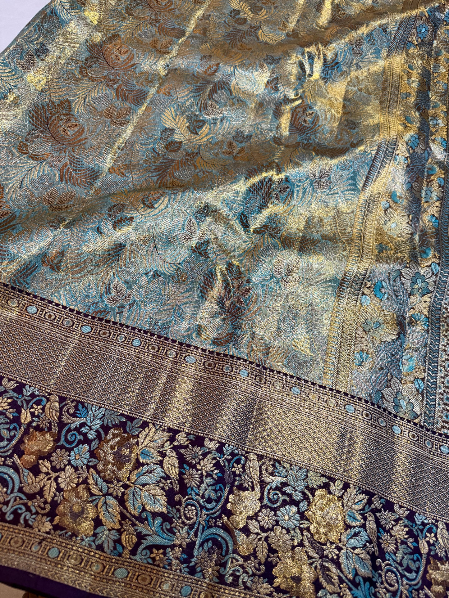 Sea Green & Blue Pure Kanchipattu Saree with Gold-Silver Zari Brocade and Meenakari Maroon Border