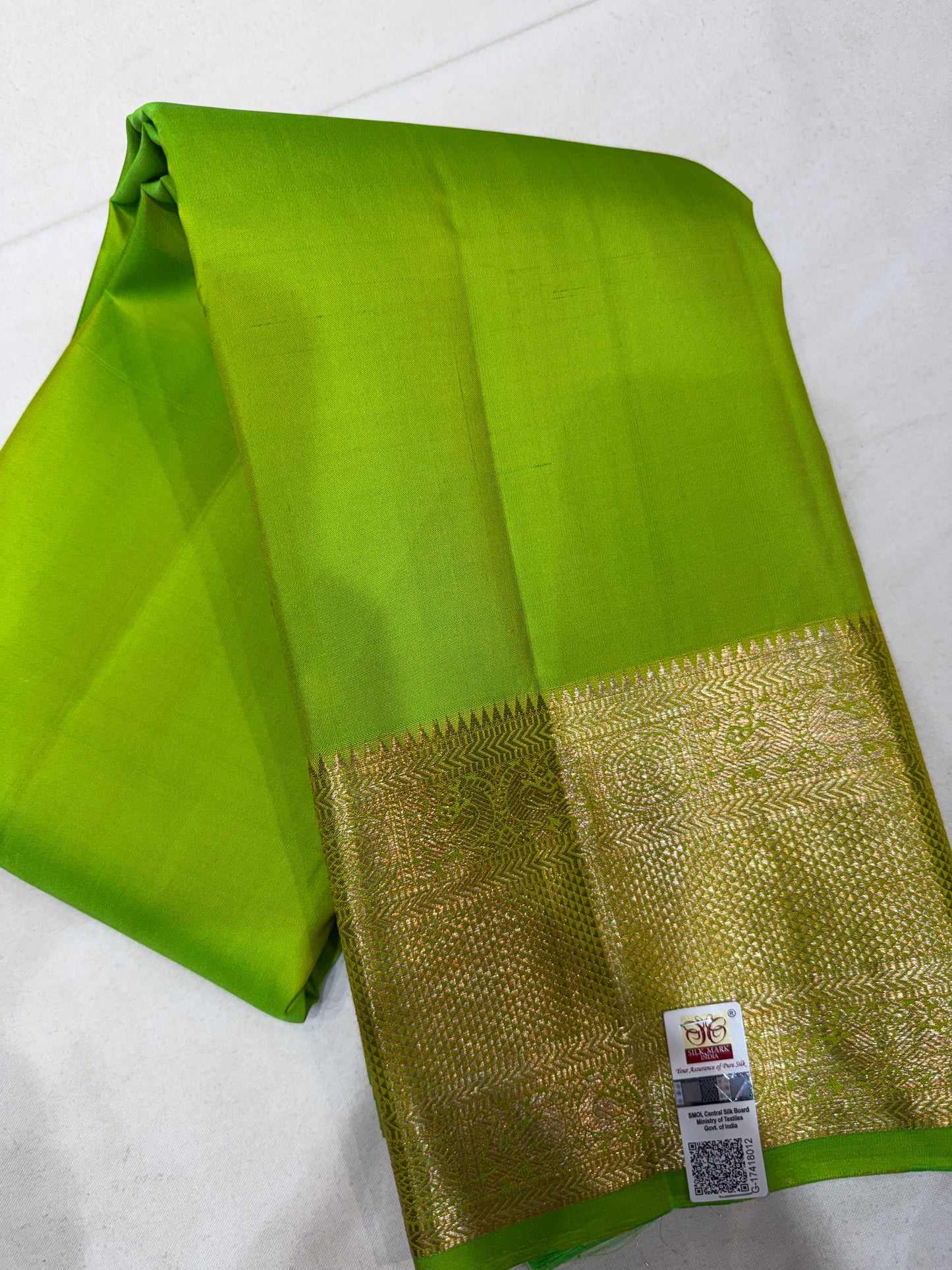 Plain Parrot Green Pure Silk Saree with Minimal Gold Border