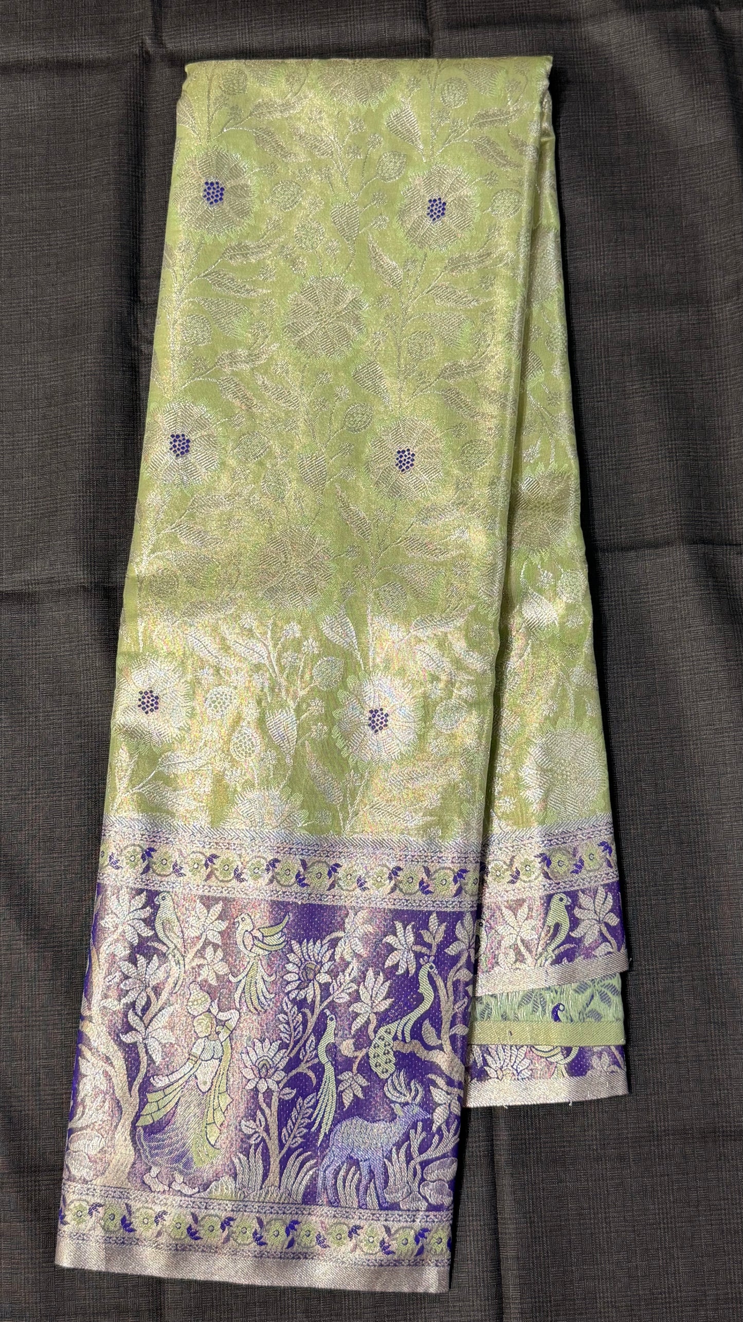 Green and purple Semi Kanchipattu sarees with traditional Meenakari border