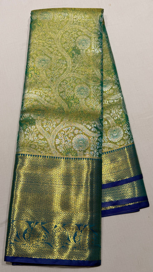 Green and gold Semi Kanchipattu sarees with  traditional  border