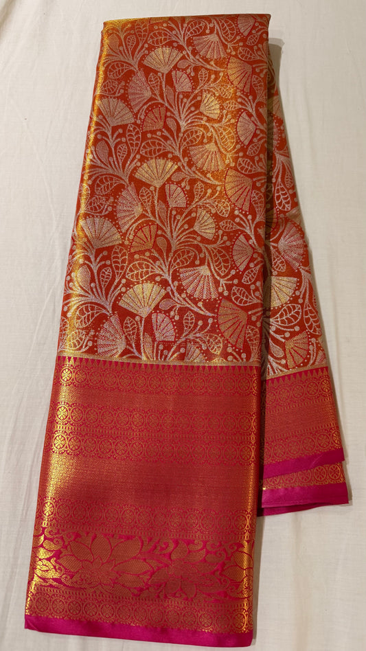 Red and gold Semi Kanchipattu sarees with red traditional  border