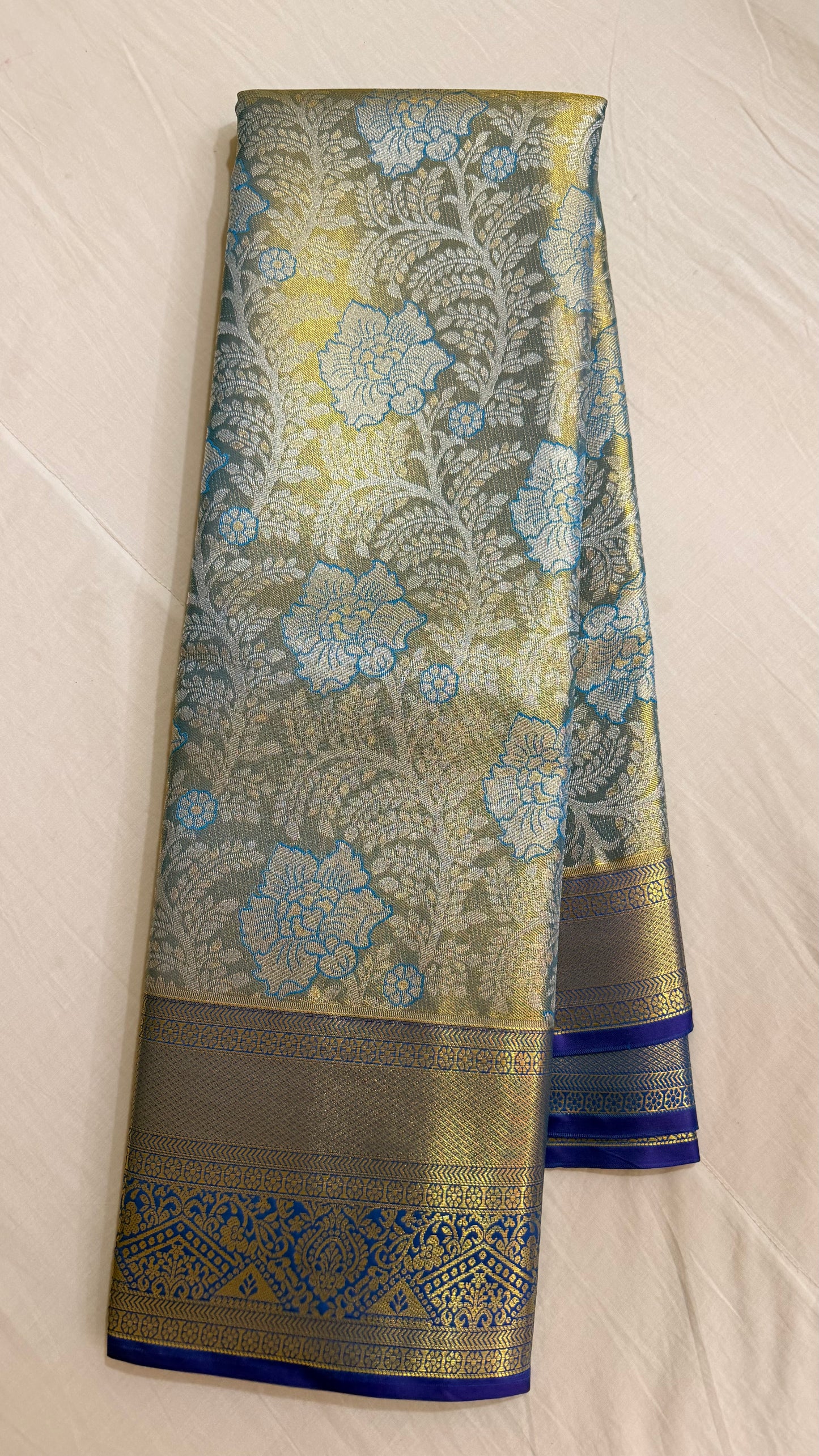Green floral Semi Kanchipattu sarees with  traditional  border