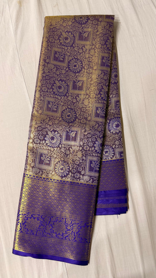 Purple and gold Semi Kanchipattu sarees with blue border