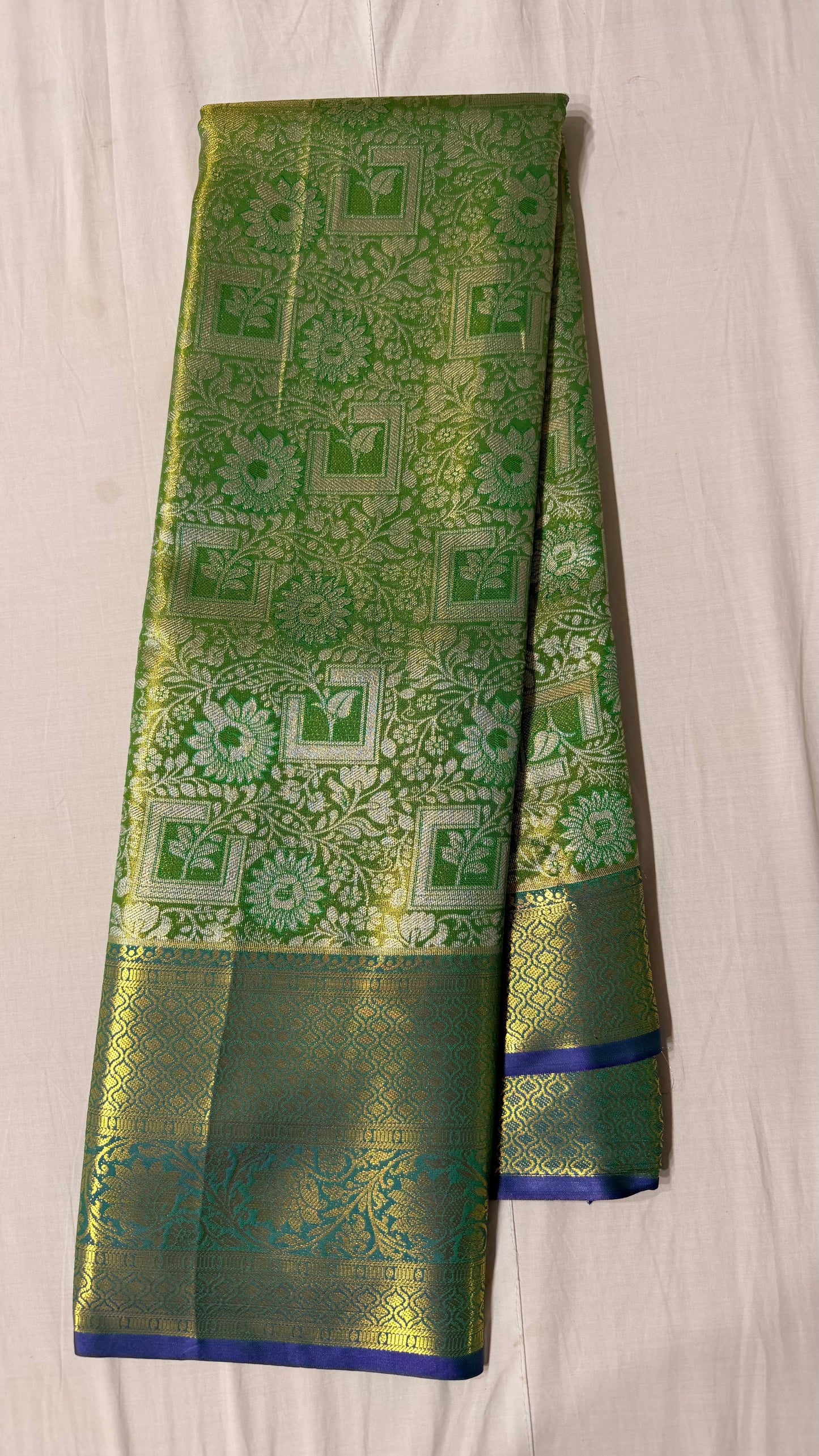 Green Semi Kanchipattu sarees with blue traditional  border