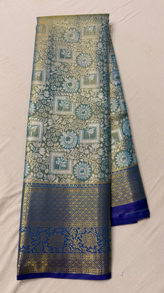 Green silver Semi Kanchipattu sarees with blue traditional  border