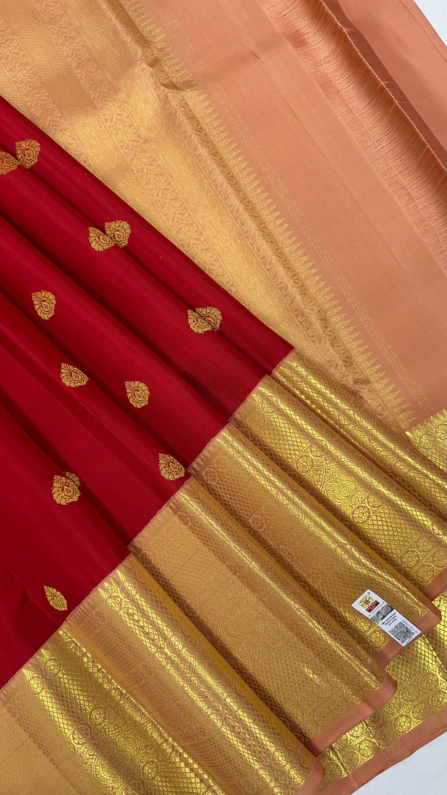 Red Saree with Traditional Motifs and Peach Pink Kanchi Border