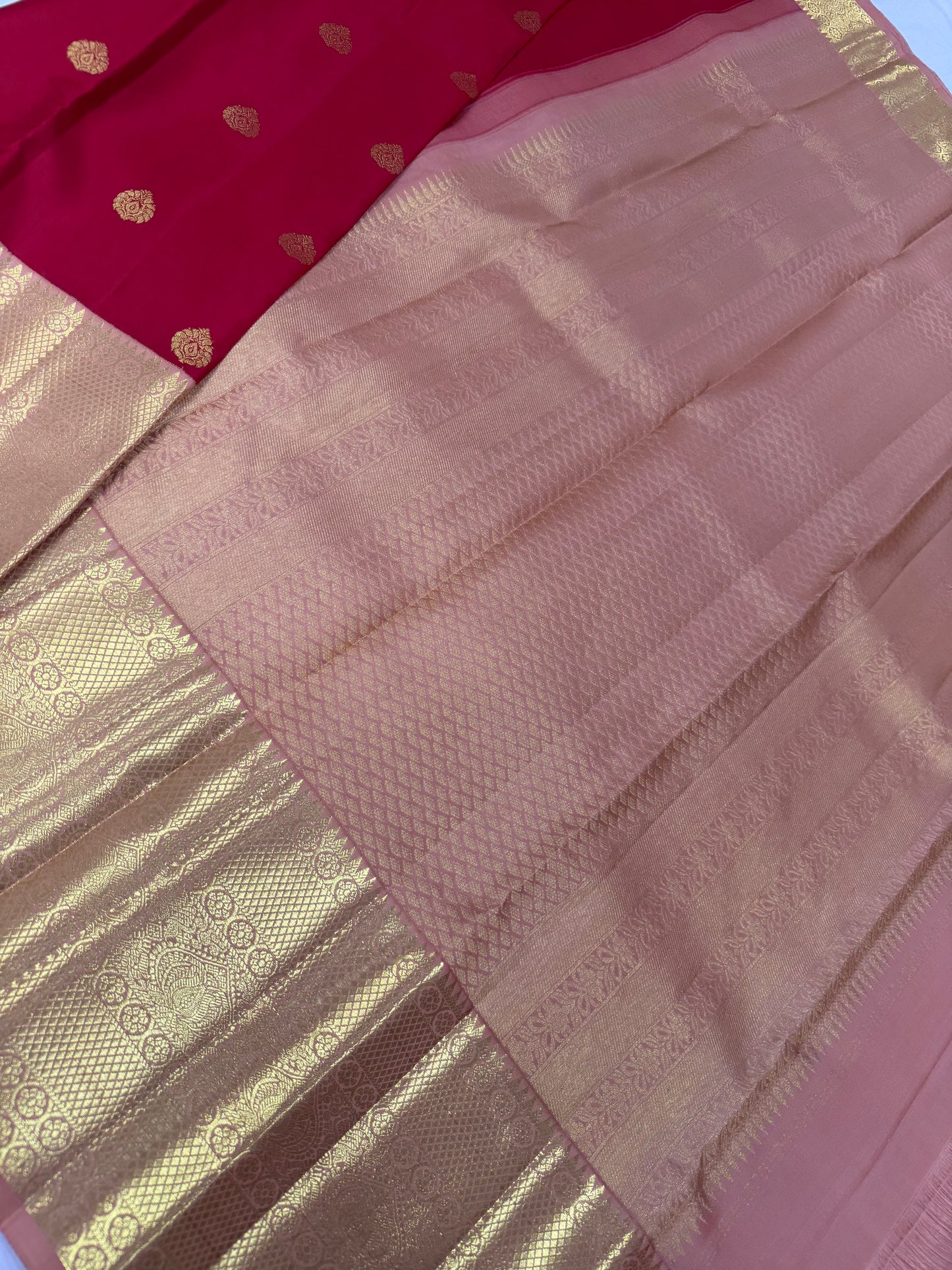 Red Saree with Traditional Motifs and Peach Pink Kanchi Border