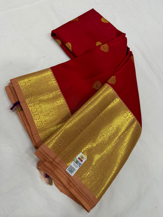 Red Saree with Traditional Motifs and Peach Pink Kanchi Border