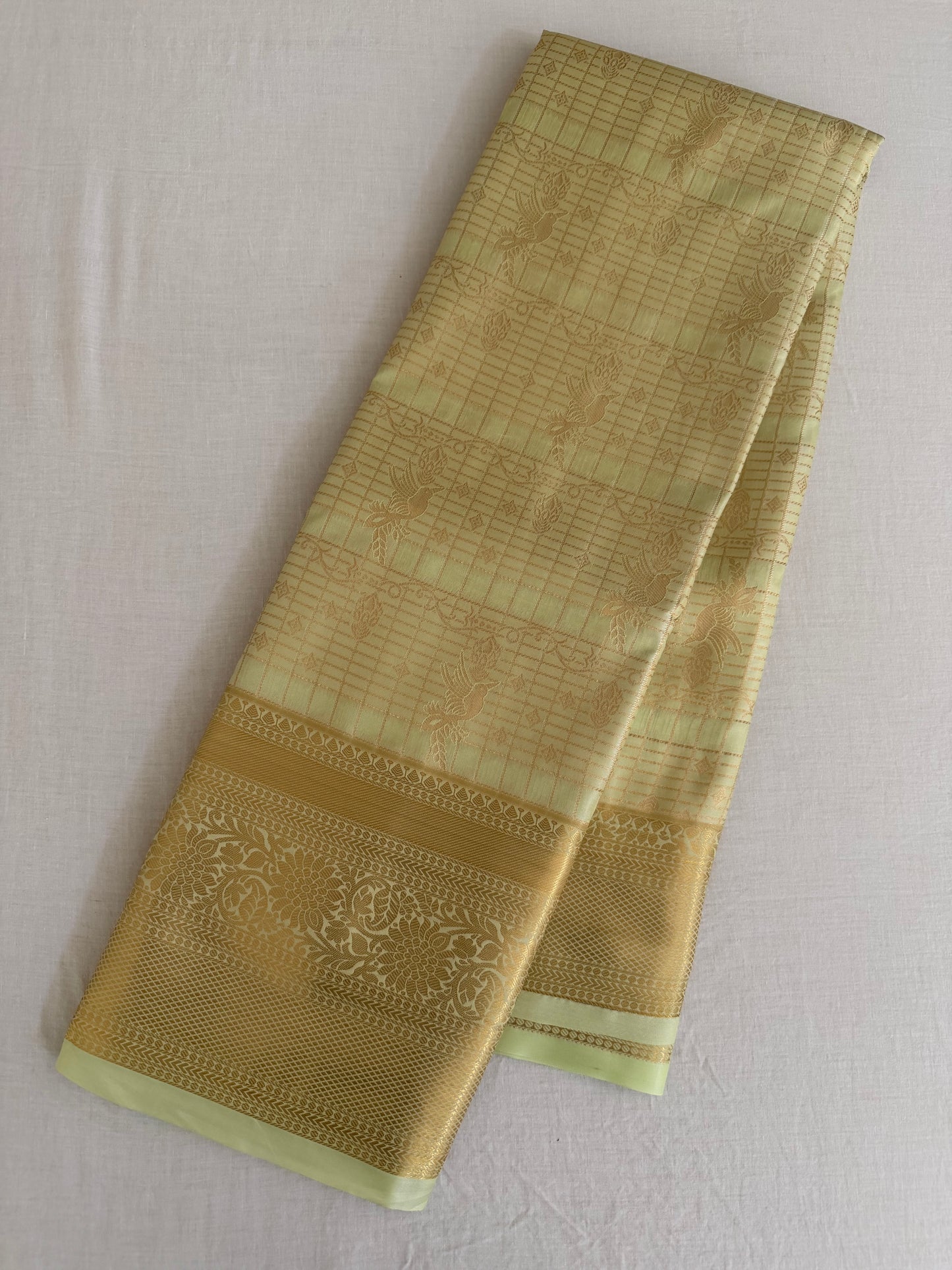 Vintage Pista Green Semi Kanchipattu Saree with Gold Zari Checks & Traditional Border