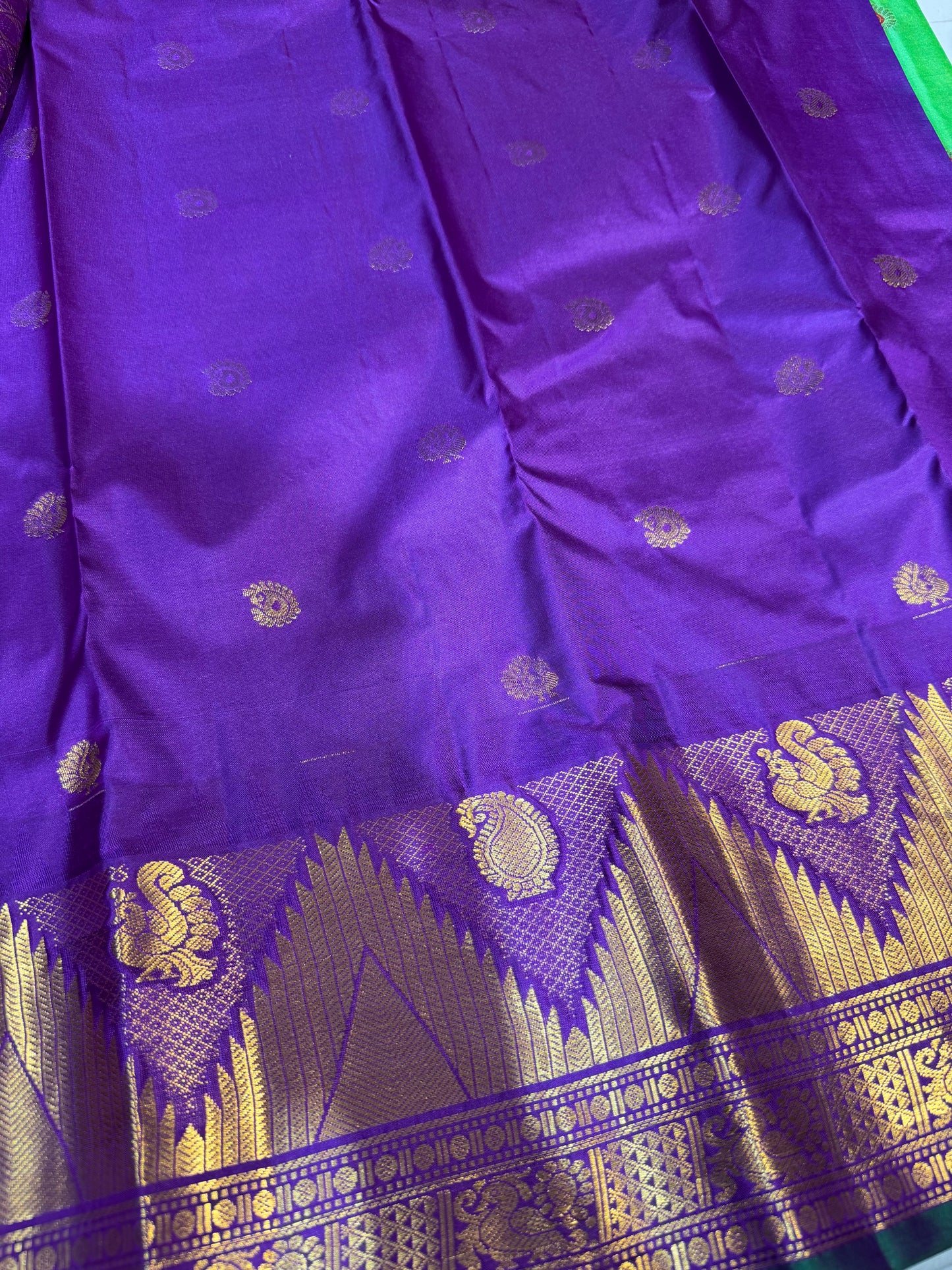 Pure Gadwal Silk Kanchipuram Saree with Green Body & Navy Blue Gopuram Border