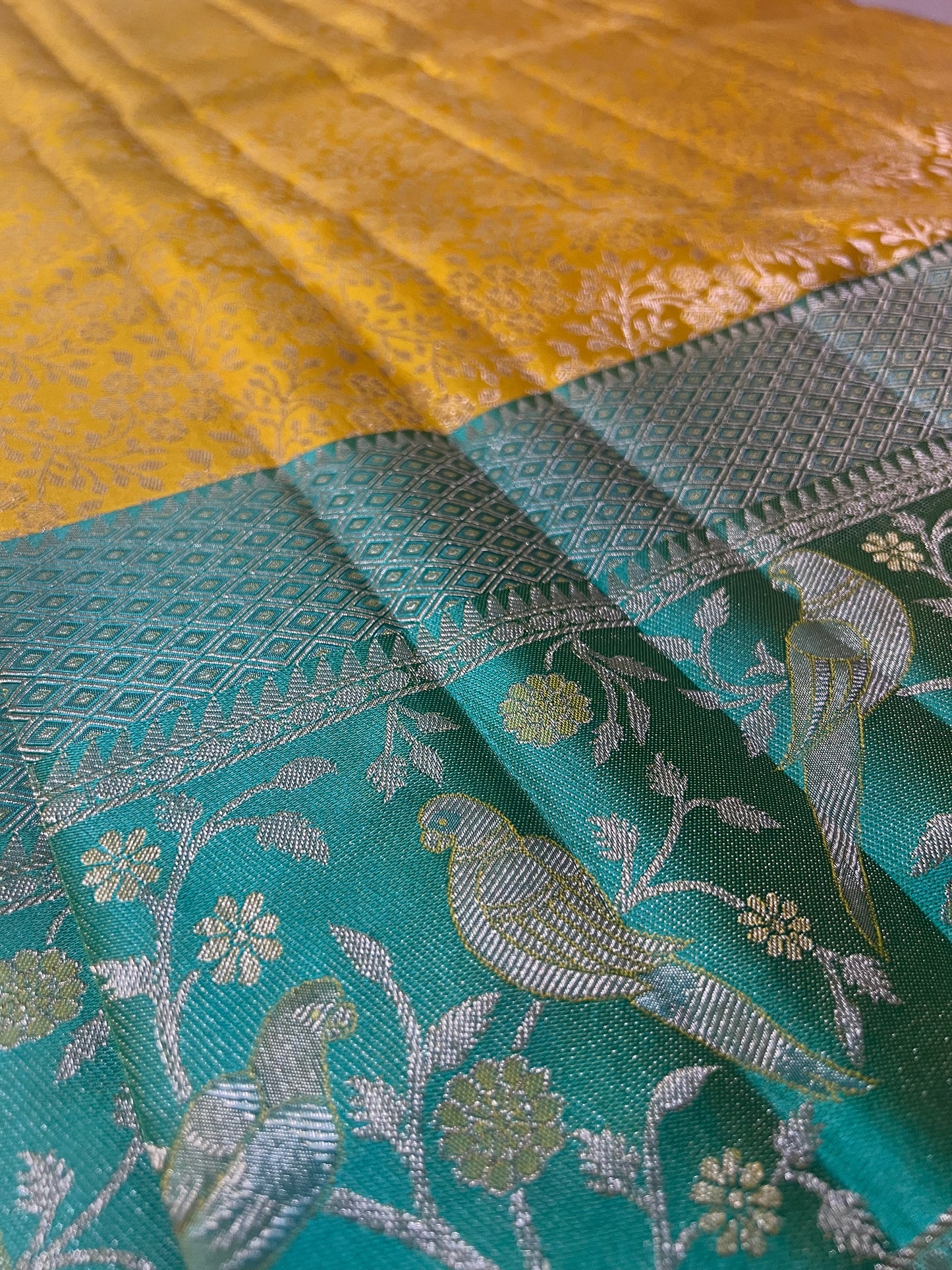 Mustard Yellow Brocade Pure Kanchipattu Saree with Sea Green Meenakari Border and 1 Gram Silver Zari