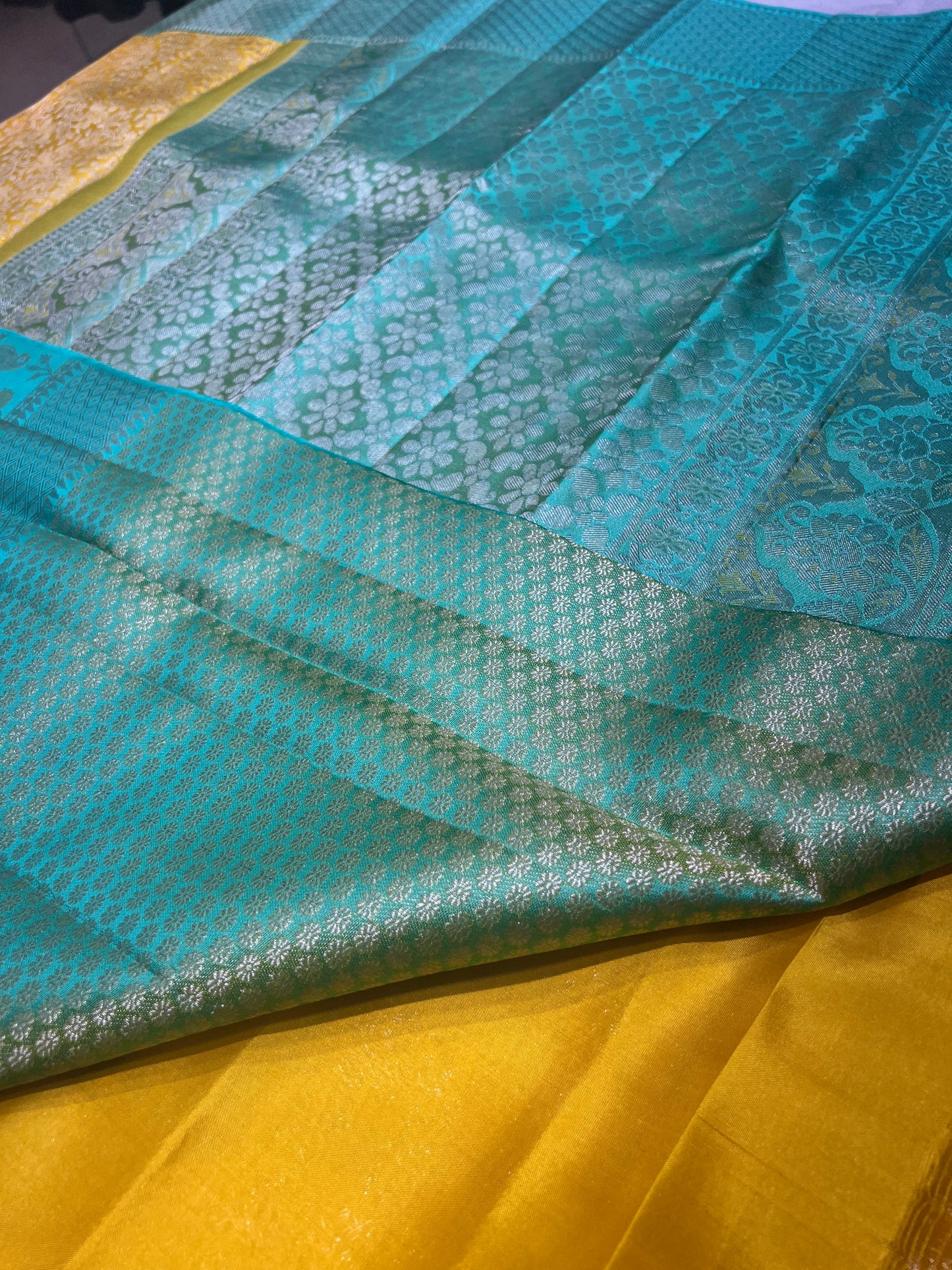 Mustard Yellow Brocade Pure Kanchipattu Saree with Sea Green Meenakari Border and 1 Gram Silver Zari