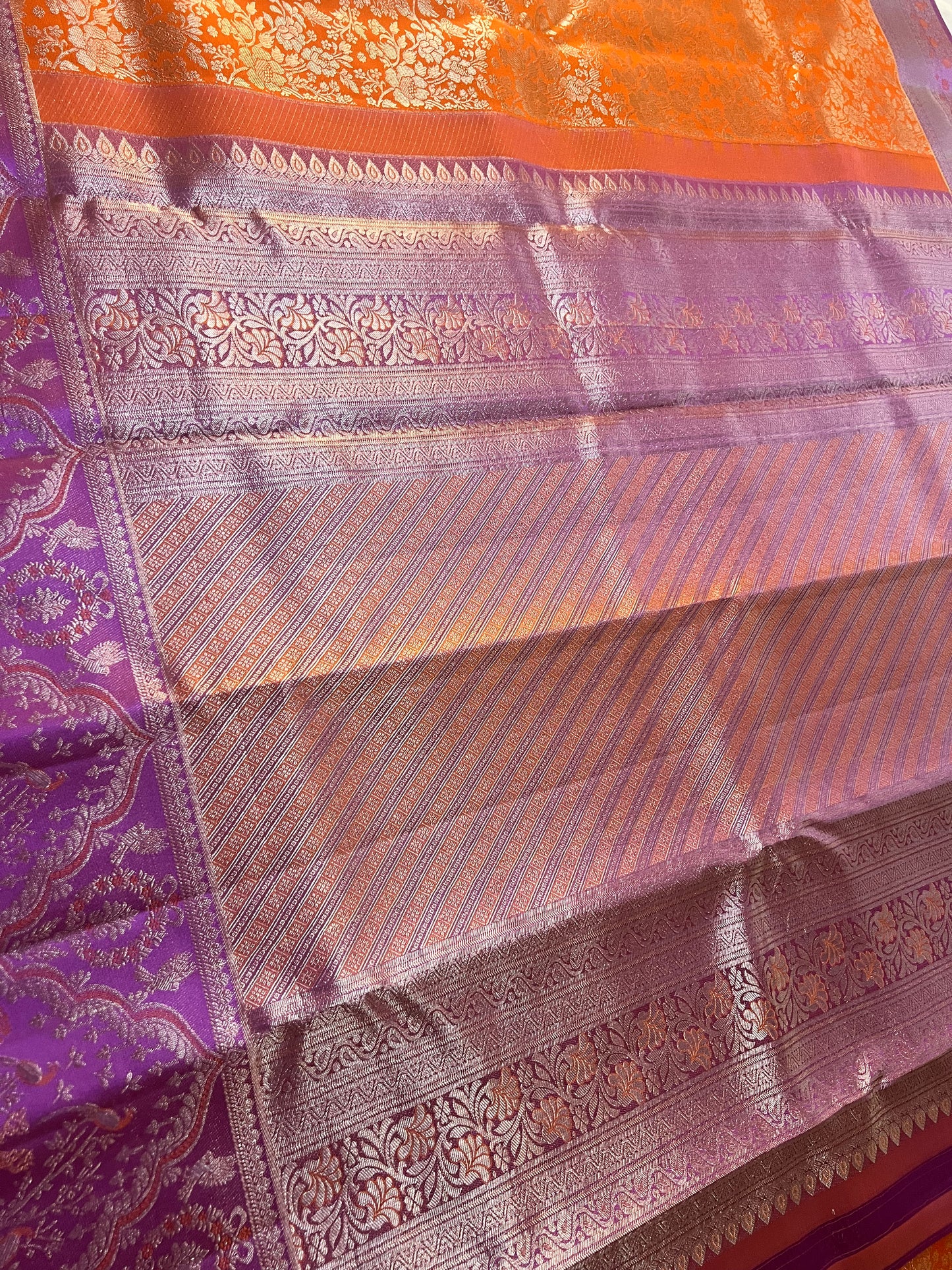 Vibrant Orange Brocade Pure Kanchipattu Saree with Rich Purple Meenakari Border & 1 Gram Silver Zari
