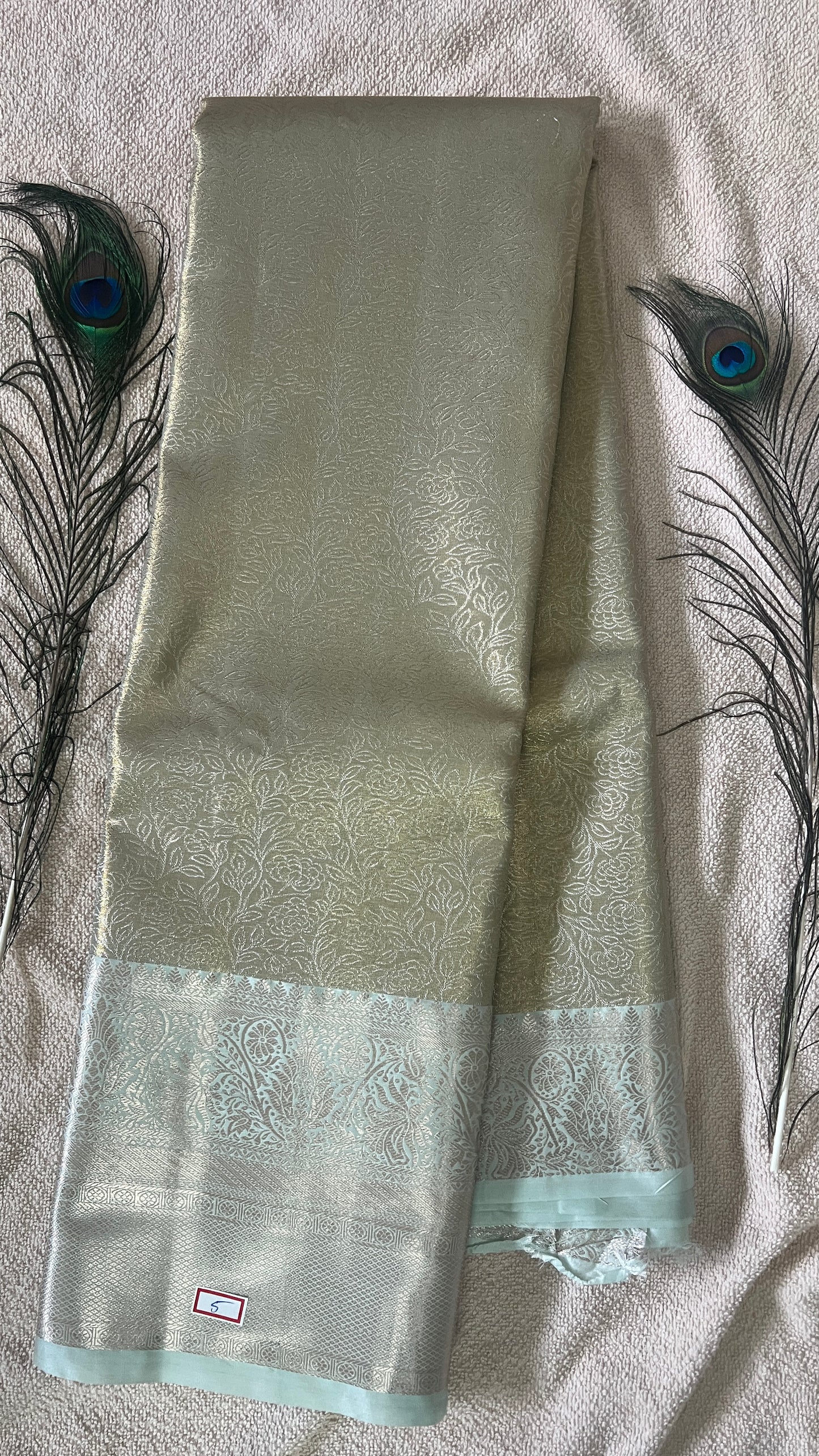 Pastel Olive Green and silver Semi Kanchipattu silk sarees with self traditional border