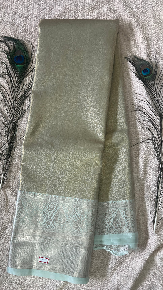 Pastel Olive Green and silver Semi Kanchipattu silk sarees with self traditional border