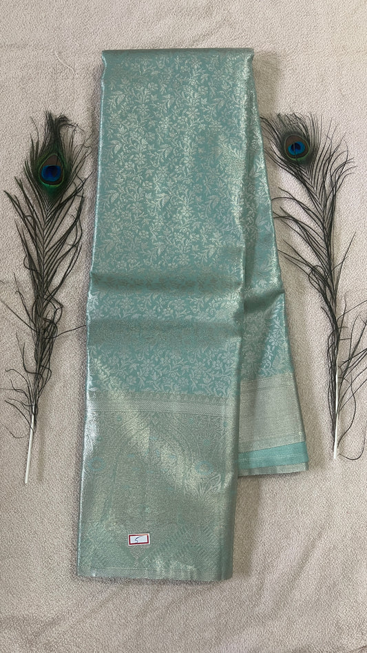 Pastel Green and silver Semi Kanchipattu silk sarees with Silver self  traditional border