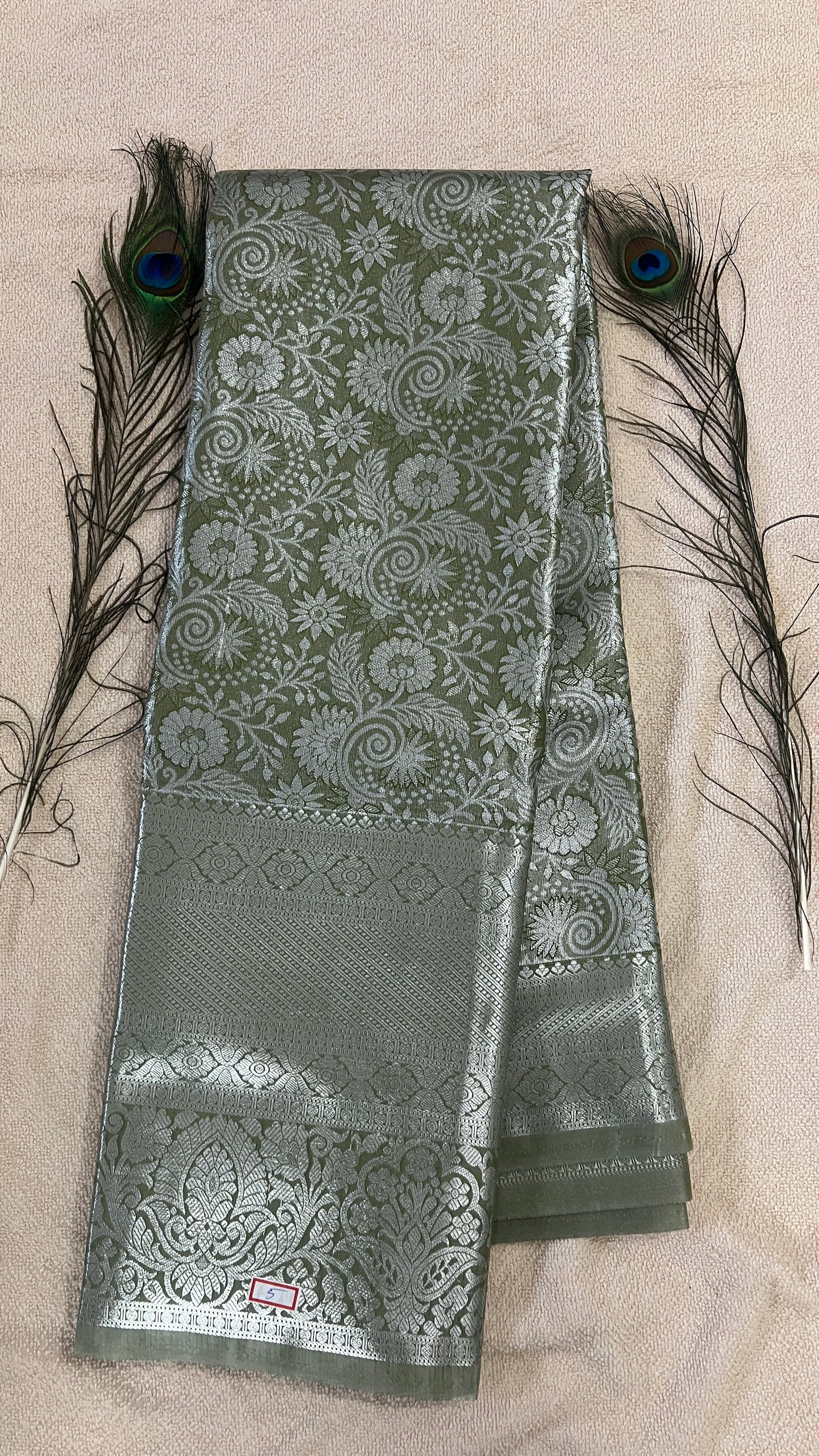 Pastel Sage Green and silver Semi Kanchipattu silk sarees with self traditional border