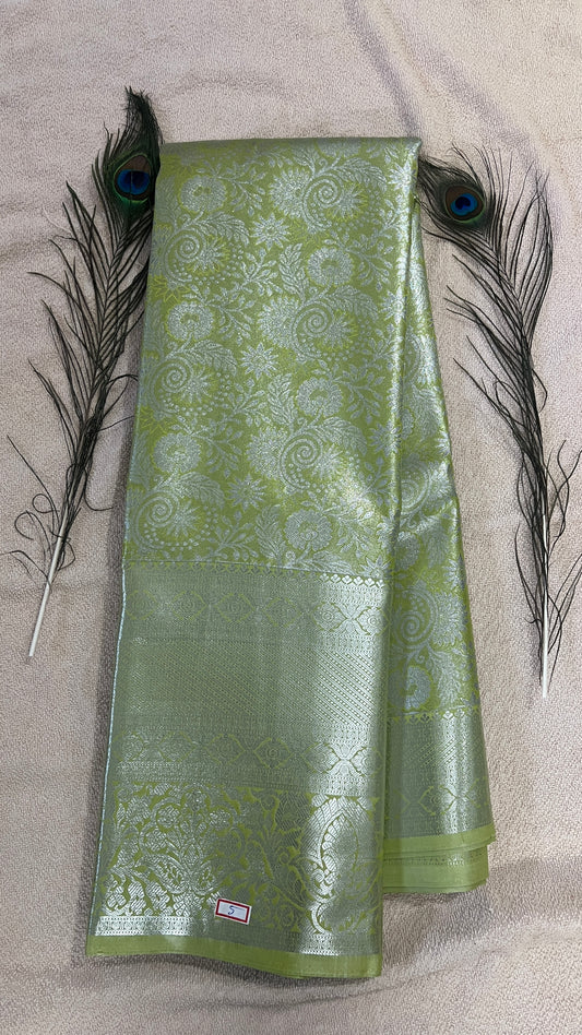 Pastel Lime Green and silver Semi Kanchipattu silk sarees with self traditional border