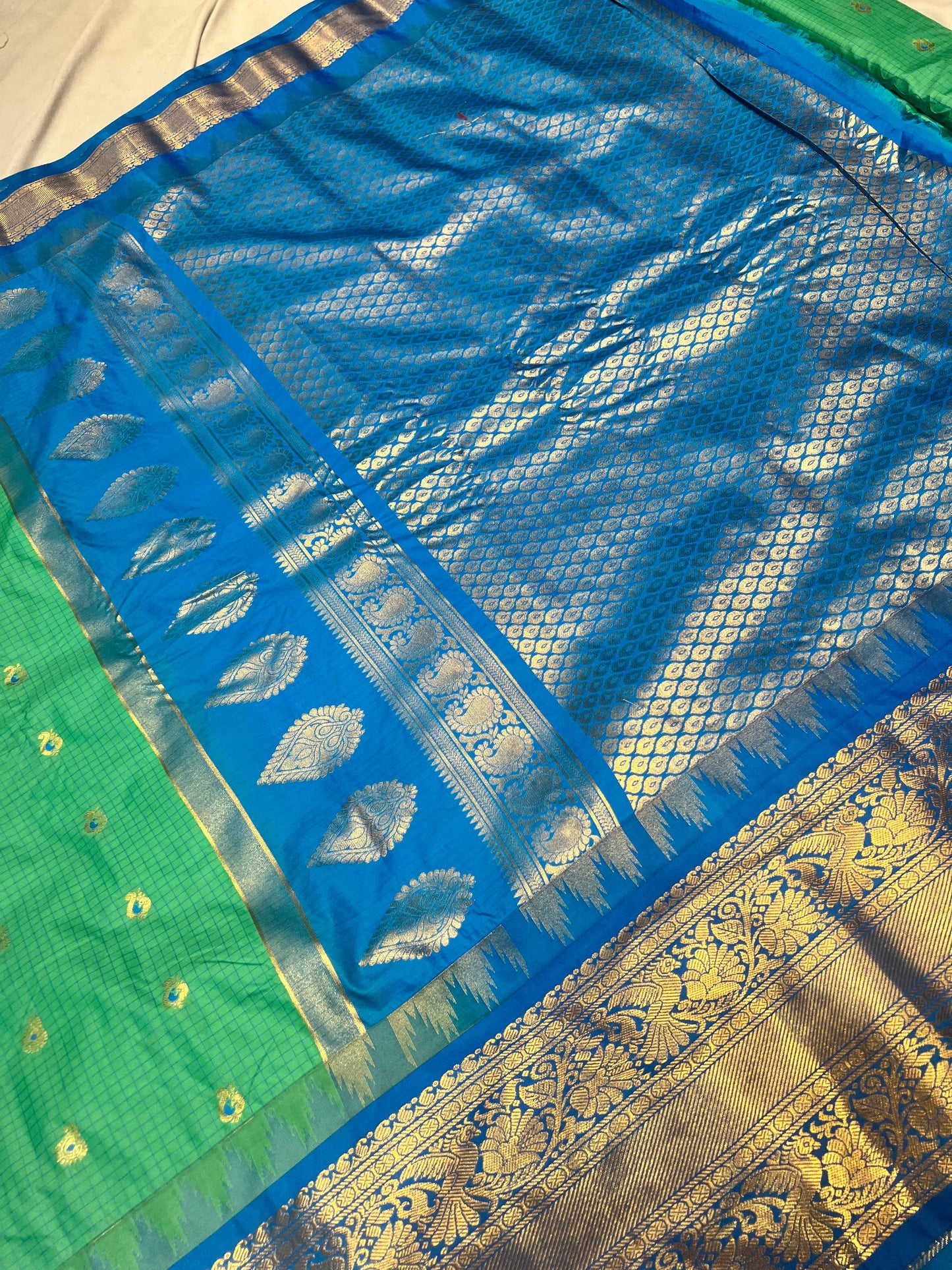 Sea green vintage semi gadwal pattu saree with blue kanchi zari border
