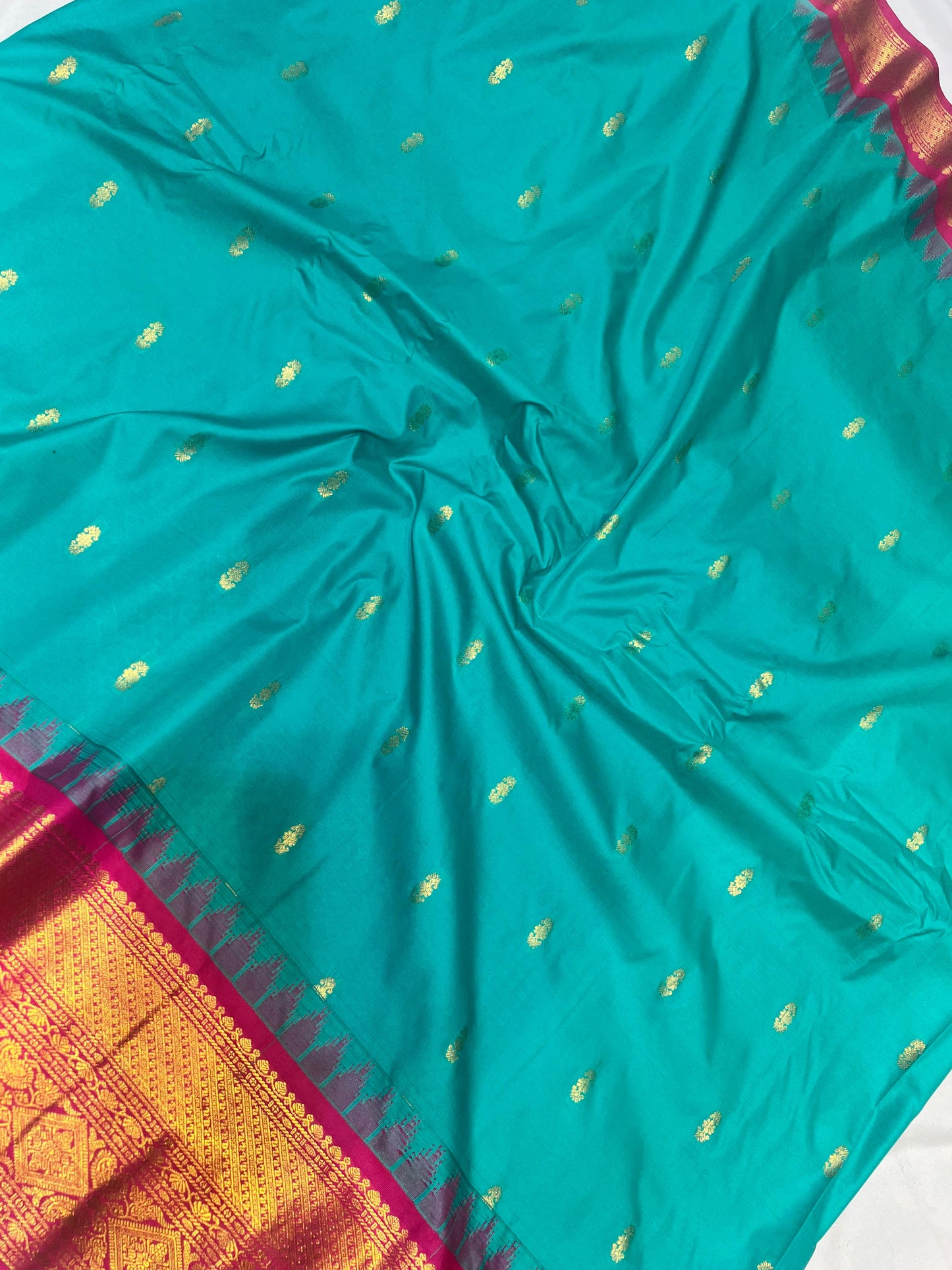 Sea Green Semi Gadwal Pattu Saree with Red Kanchi Border